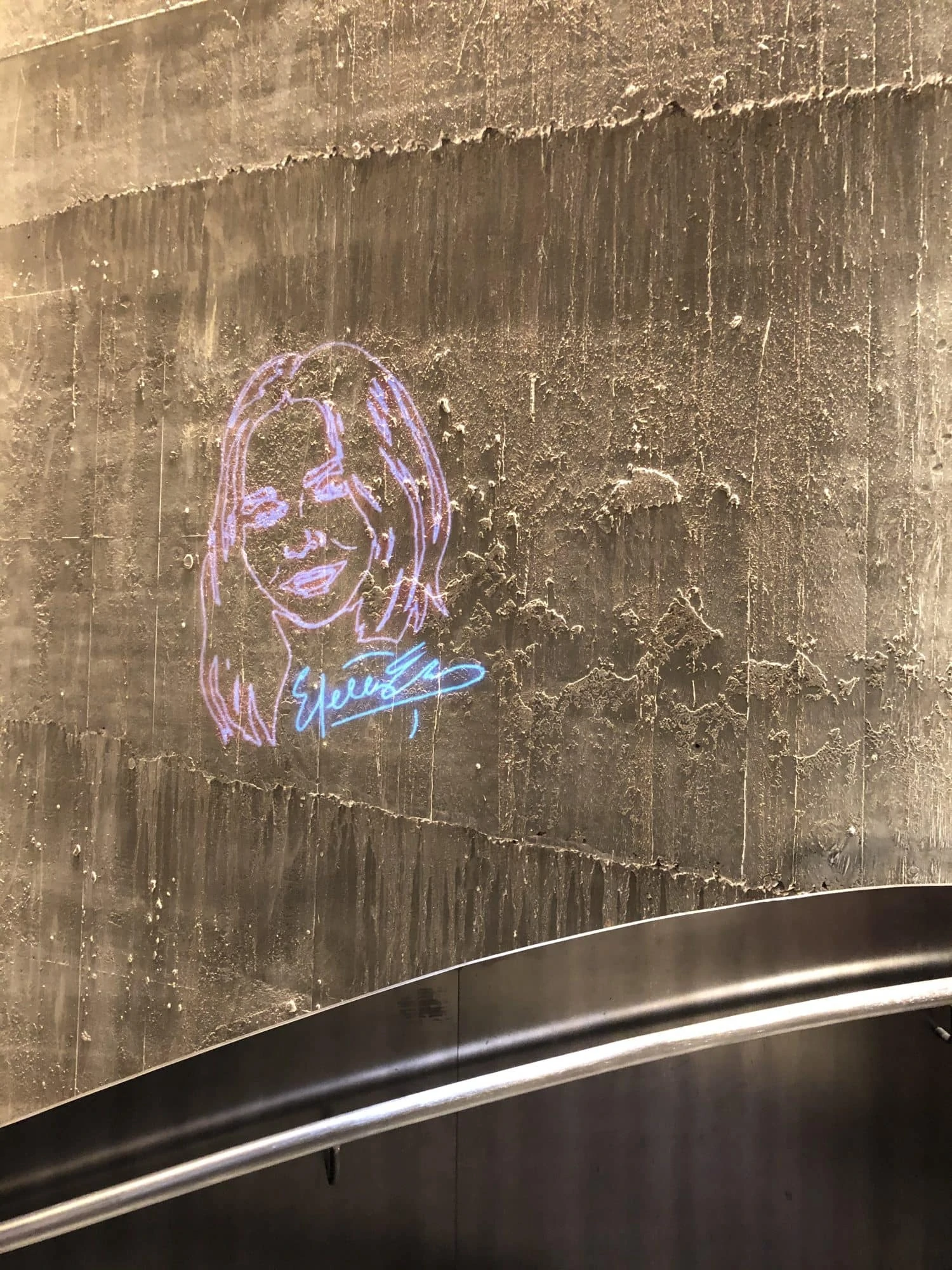 Stella mccartney&#039;s face painted on a wall