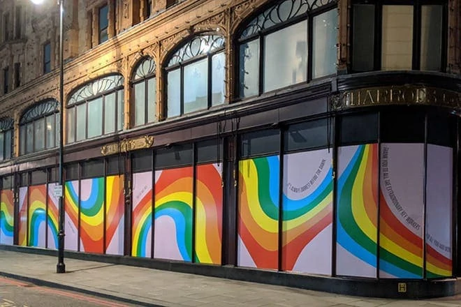 rainbow covered windows at Harrods