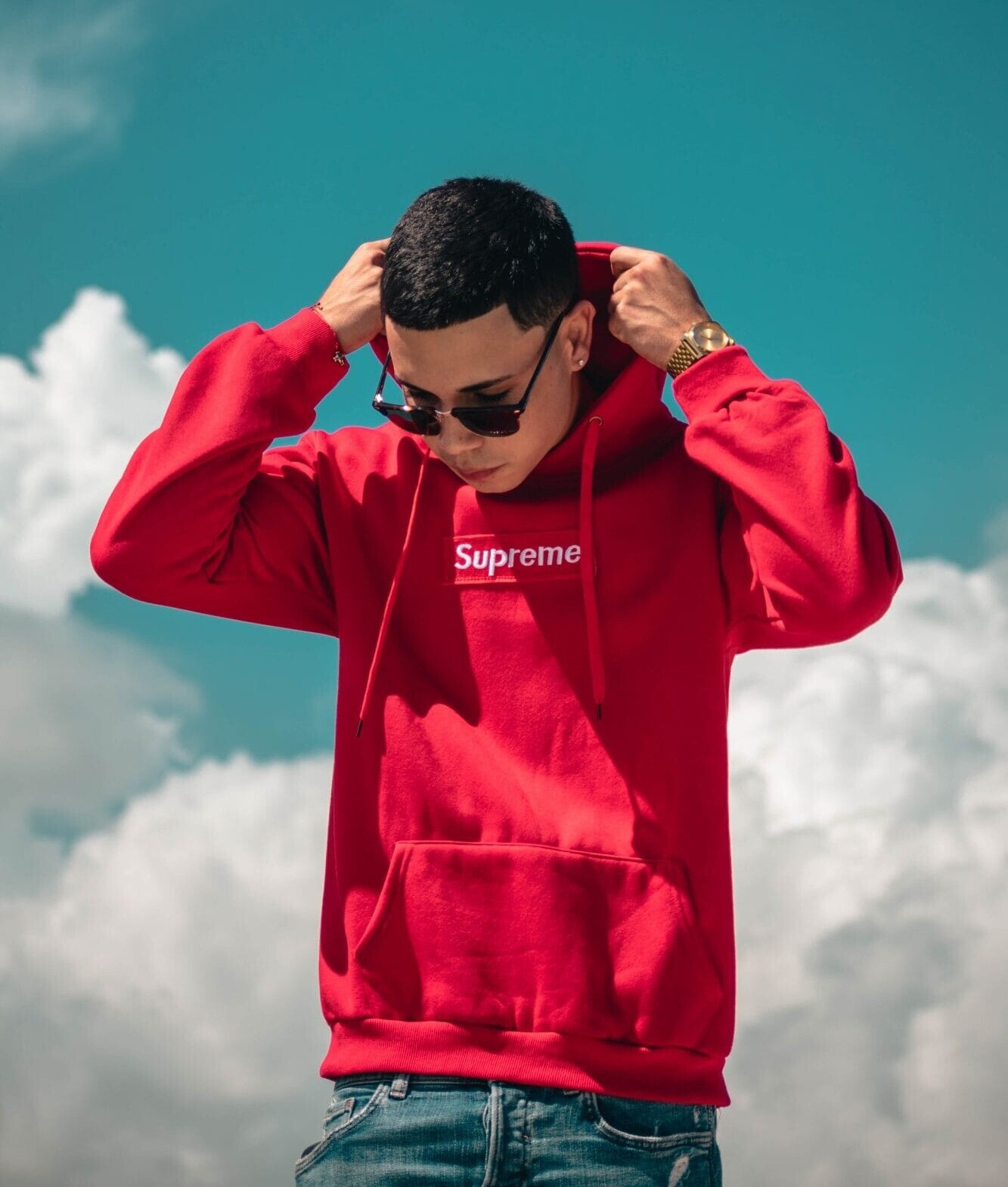 Man in Supreme hoodie from drop culture campaign